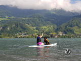 Sup avec le chien sur le lac Walensee